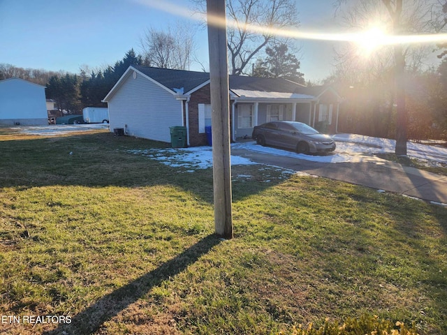 view of home's exterior featuring a yard