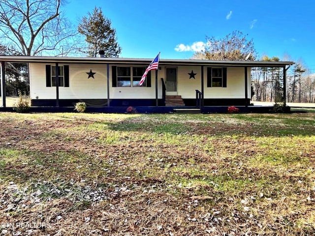 single story home with a front yard