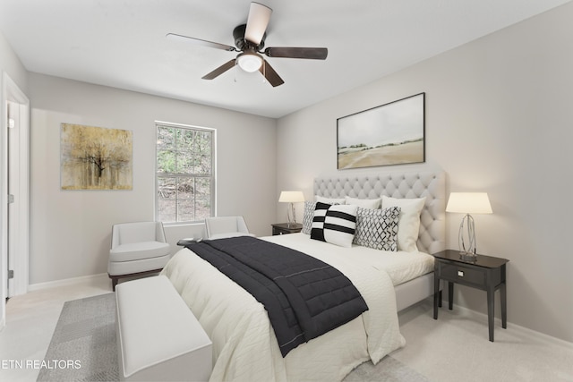 bedroom with carpet floors, baseboards, and a ceiling fan