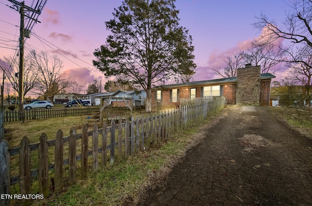 view of property exterior at dusk