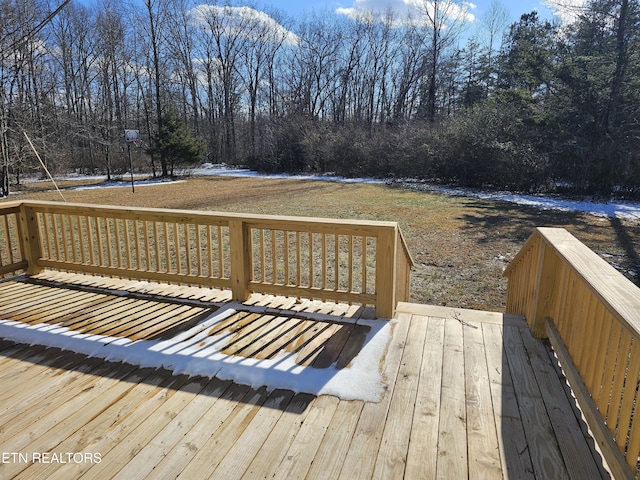 wooden deck with a yard