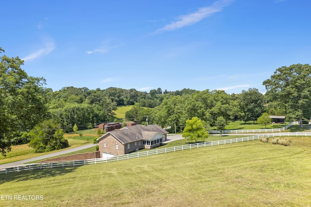 birds eye view of property featuring a rural view