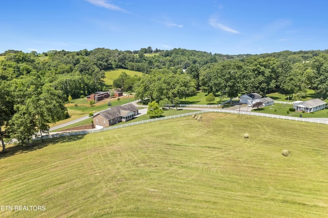 birds eye view of property featuring a rural view