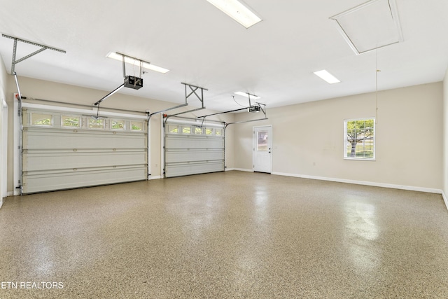 garage featuring a garage door opener