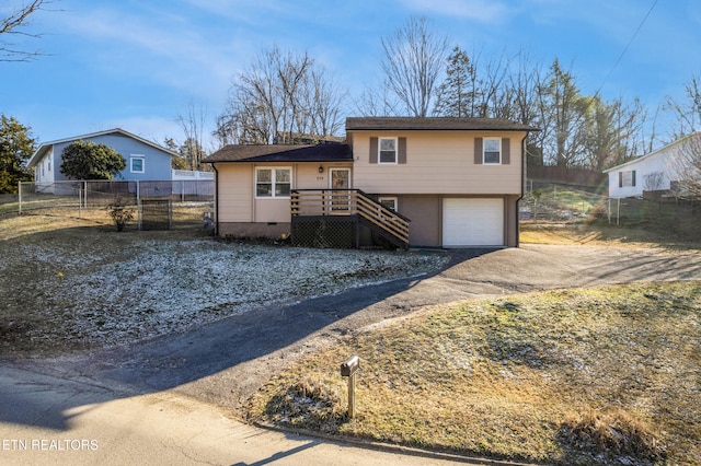 view of front of house with a garage