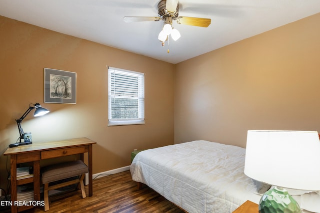 bedroom featuring dark wood-type flooring and ceiling fan