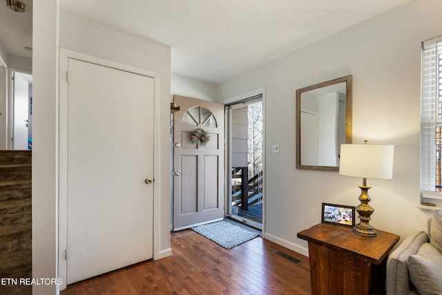 foyer featuring dark hardwood / wood-style floors