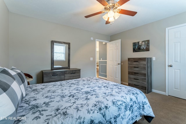 carpeted bedroom featuring ceiling fan