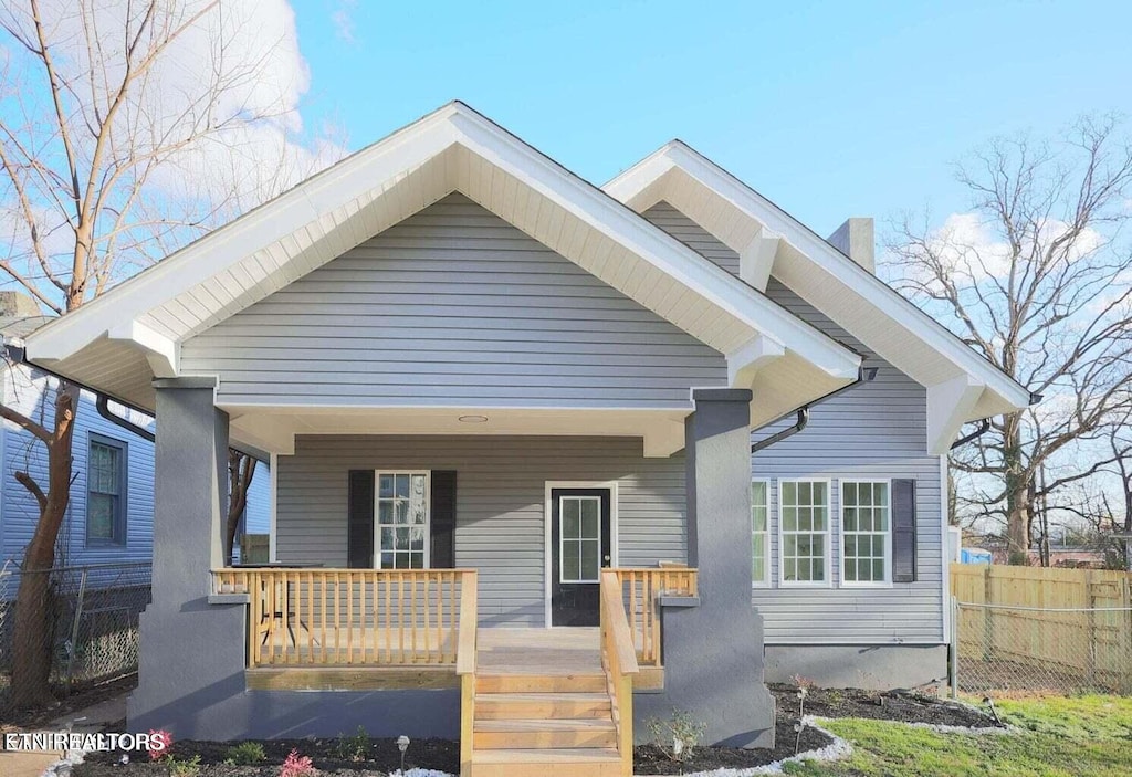 bungalow-style house featuring covered porch