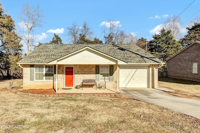 view of front facade featuring a garage, a porch, and a front yard