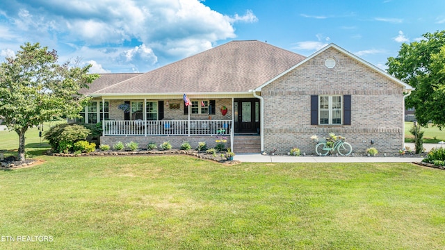 ranch-style house with a front lawn and a porch