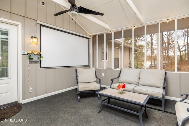 sunroom featuring vaulted ceiling and ceiling fan