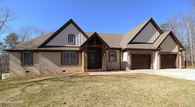 view of front of home featuring a garage and a front lawn