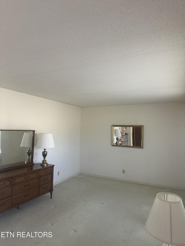 interior space featuring a textured ceiling