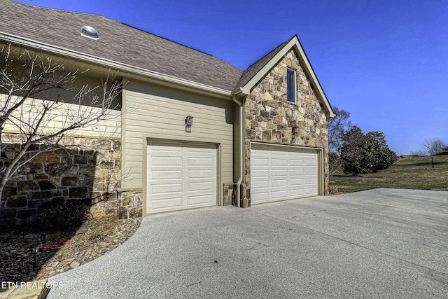 garage with driveway