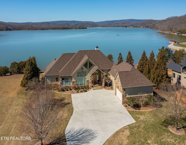 drone / aerial view featuring a water view