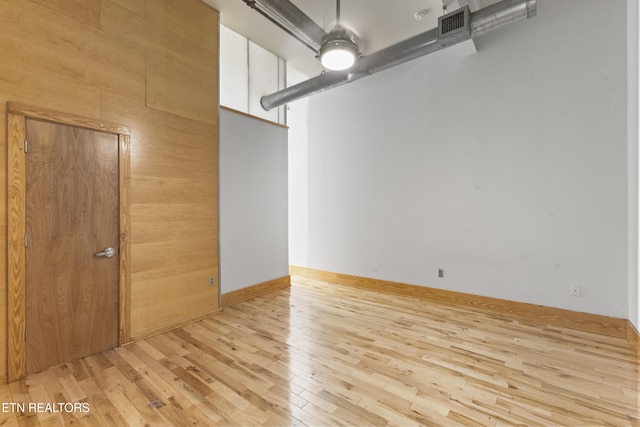 unfurnished dining area featuring light hardwood / wood-style flooring