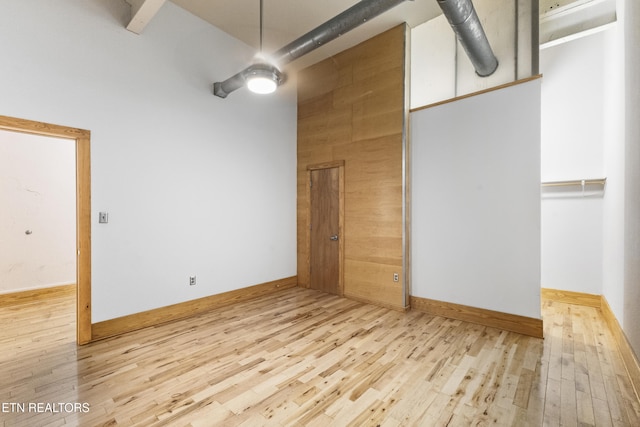 unfurnished bedroom with light wood-type flooring