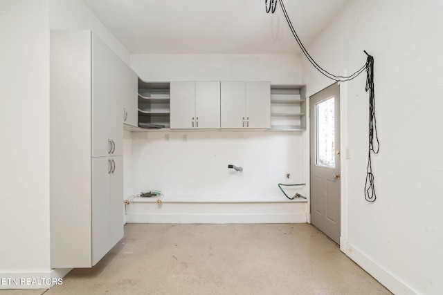 interior space featuring white cabinetry