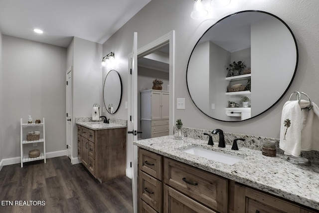 bathroom with vanity and wood-type flooring