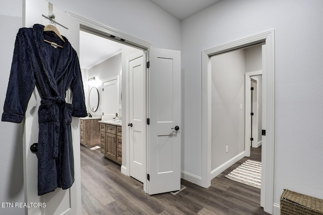 hallway featuring wood-type flooring