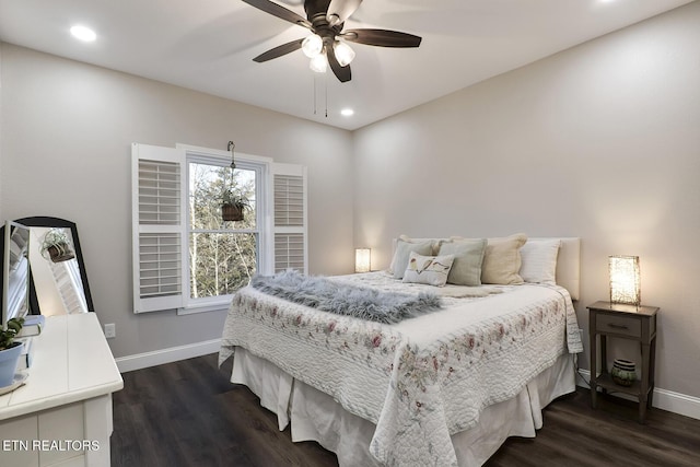 bedroom featuring dark hardwood / wood-style flooring and ceiling fan