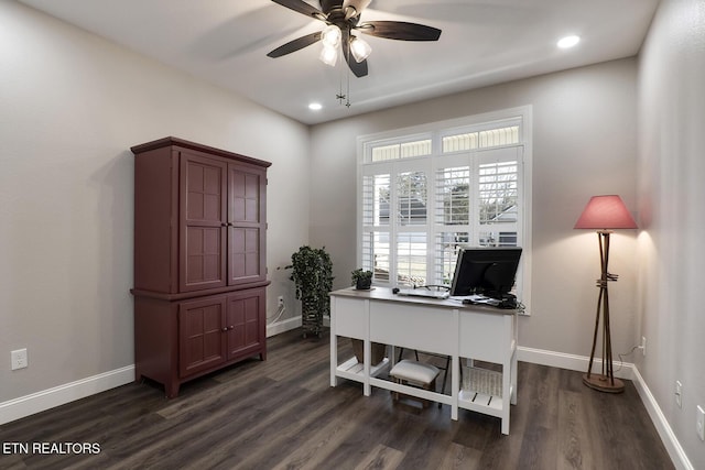 office with dark hardwood / wood-style floors and ceiling fan