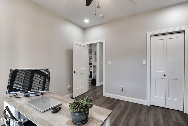 office space with ceiling fan and dark hardwood / wood-style floors