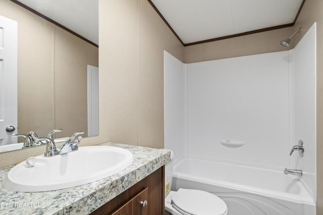 full bathroom with vanity, crown molding, bathtub / shower combination, and toilet