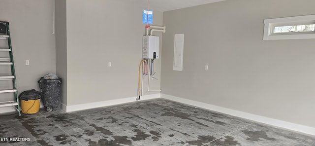 garage with water heater, baseboards, and electric panel