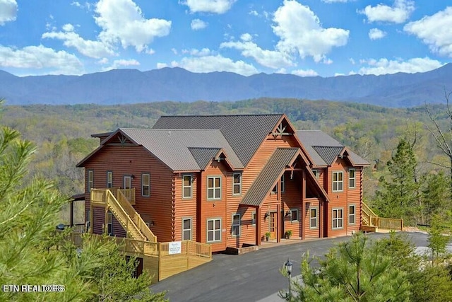 log home with a mountain view