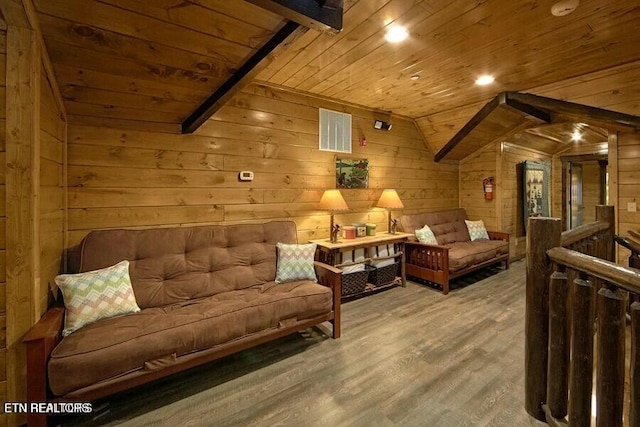 living area with vaulted ceiling with beams, hardwood / wood-style floors, wooden ceiling, and wooden walls