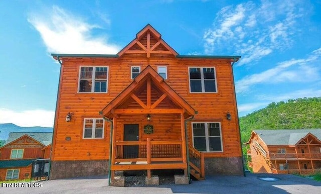 view of log cabin