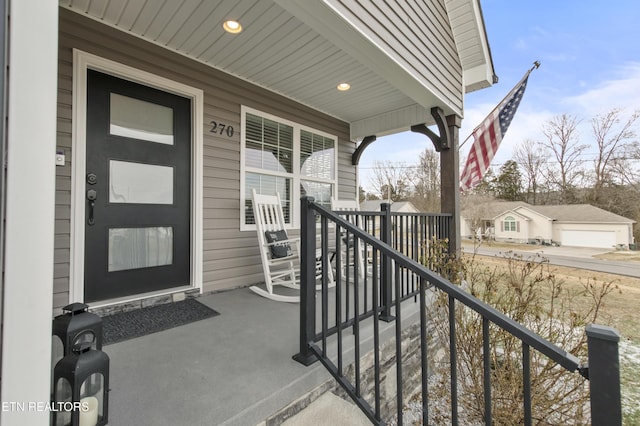 entrance to property with covered porch