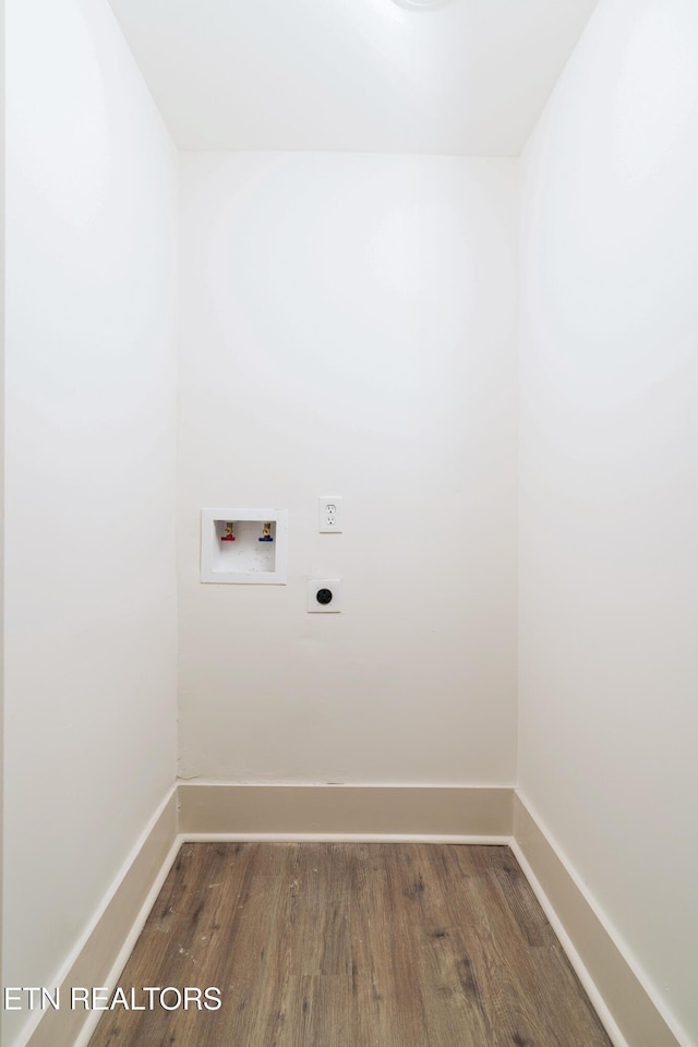 laundry area with washer hookup, dark hardwood / wood-style flooring, and electric dryer hookup