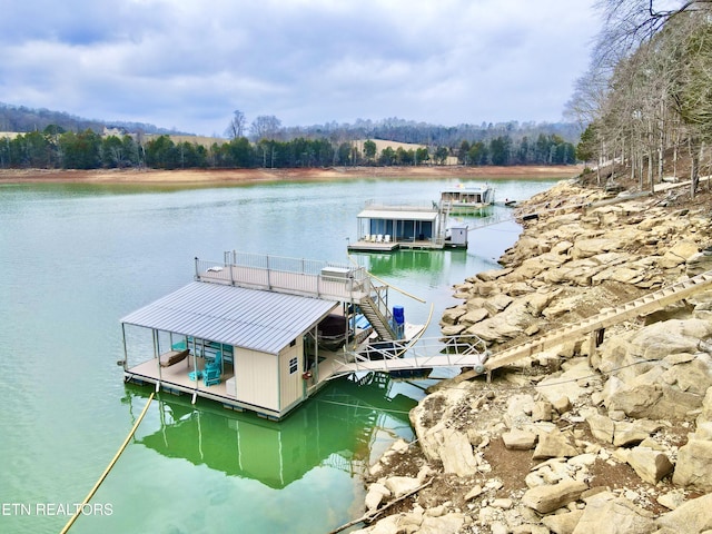 view of dock with a water view