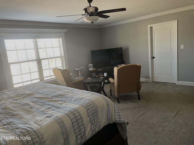 bedroom featuring crown molding, ceiling fan, and carpet flooring