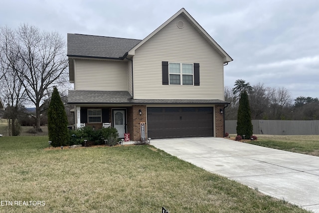 view of front property featuring a garage and a front lawn