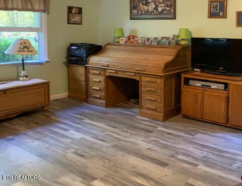 office space with light hardwood / wood-style floors