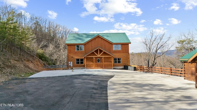 cabin featuring a mountain view