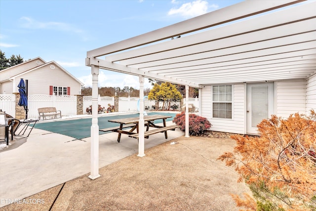 view of pool with a pergola and a patio