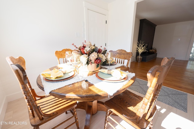 dining room with light wood-type flooring