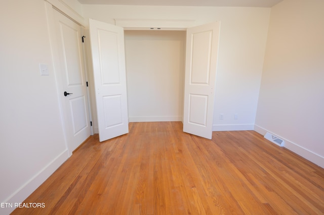 unfurnished bedroom featuring light hardwood / wood-style flooring