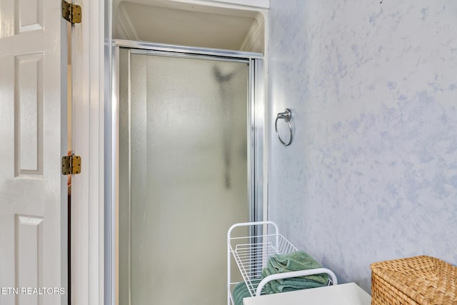 bathroom with walk in shower