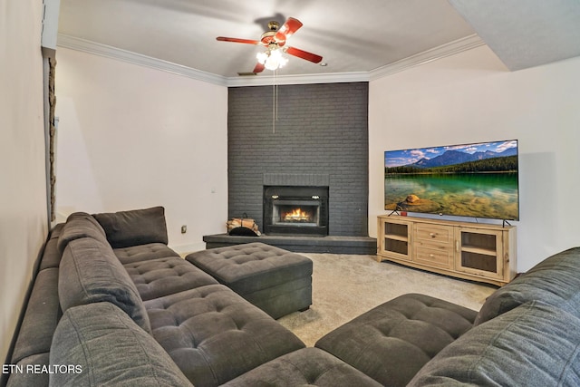 living room featuring light carpet, crown molding, a fireplace, and ceiling fan