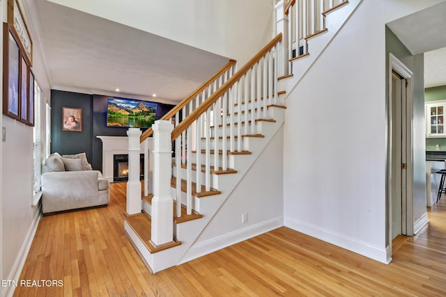 stairway featuring hardwood / wood-style flooring