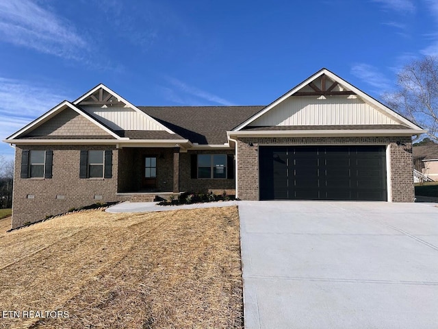 craftsman-style house with crawl space, a garage, concrete driveway, and brick siding