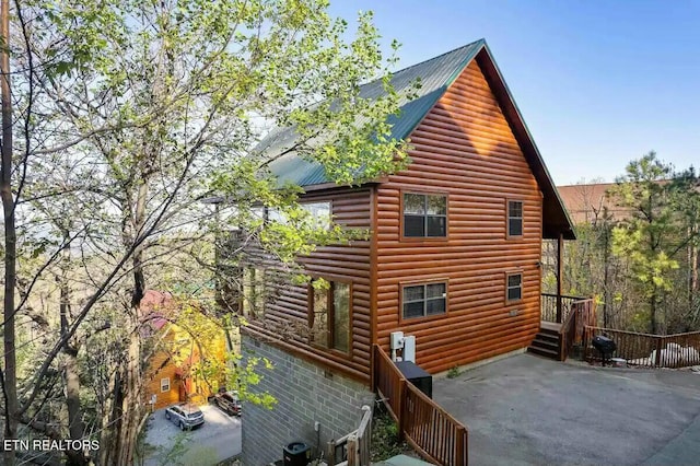 view of home's exterior featuring a patio