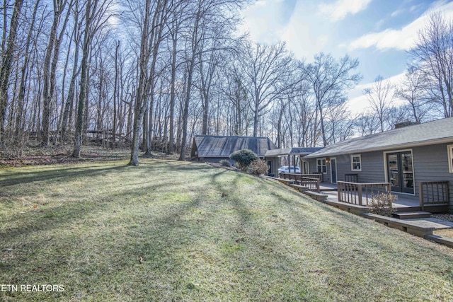 view of yard with a deck