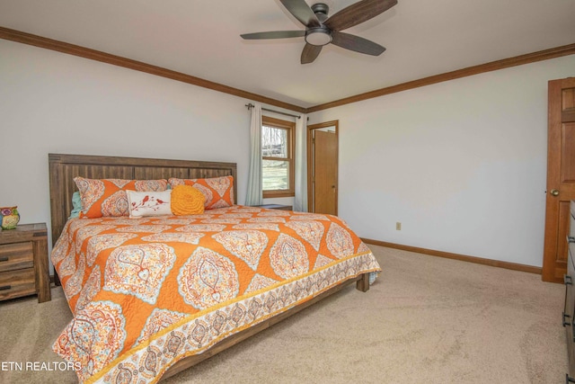 carpeted bedroom with ornamental molding and ceiling fan